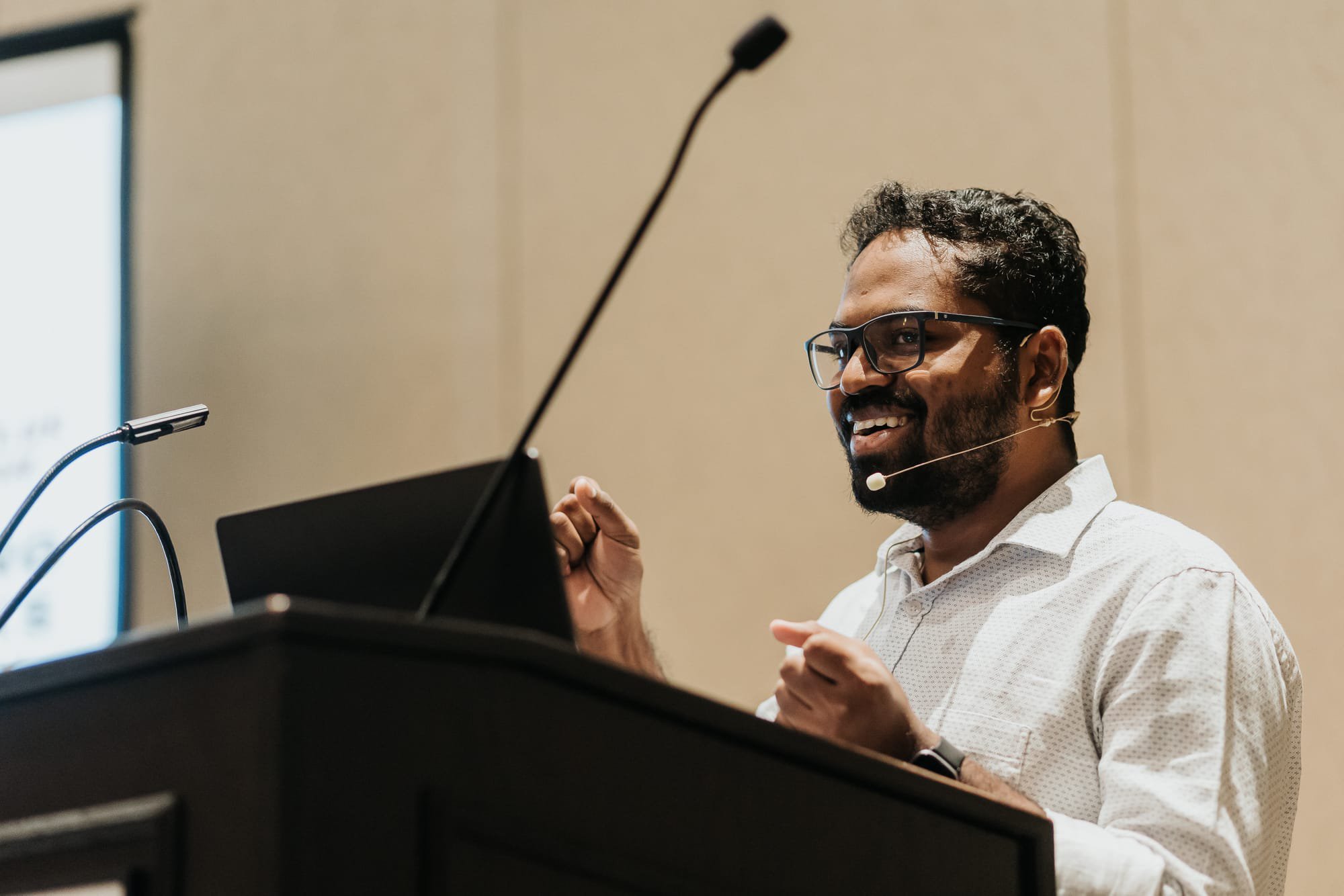 Kuldeep Pisda speaking at a conference